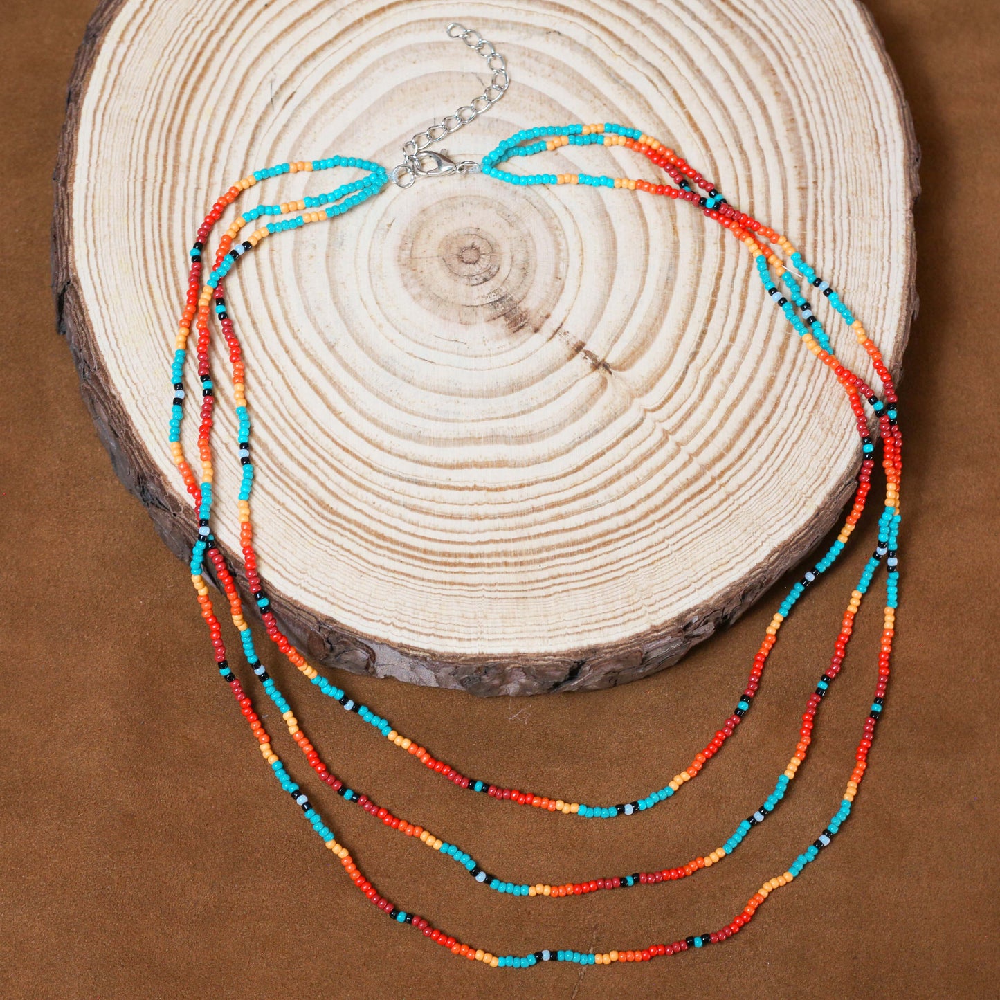 Sunset Glow Beaded Necklace And Bracelets Set – Multi-Strand with Red, Orange, and Turquoise Beads