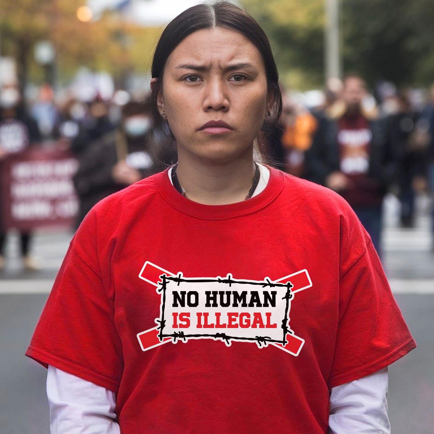 No Human Is Illegal Unisex T-Shirt/T-Shirt V-Neck/Hoodie/Sweatshirt - Empowerment for Immigrant Rights, Support for Human Dignity