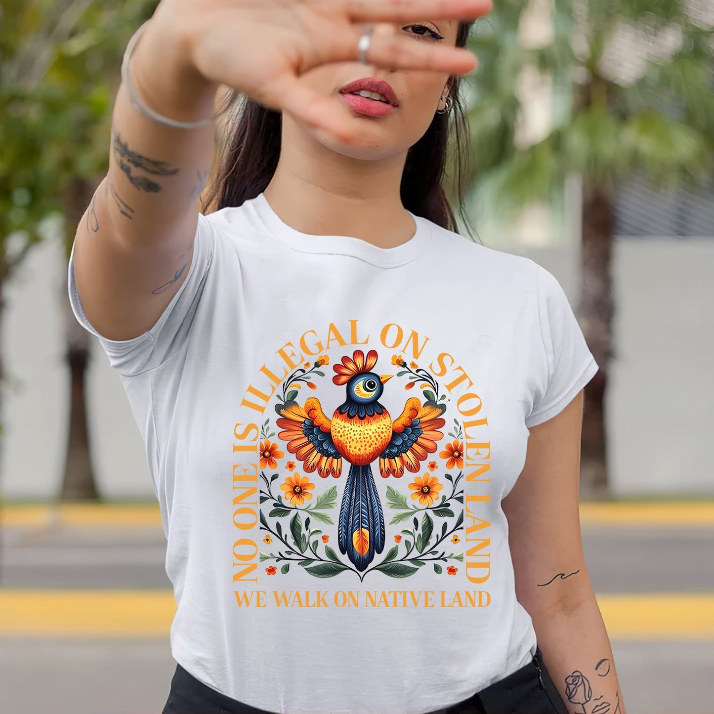 NO ONE IS ILLEGAL ON STOLEN LAND. WE WALK ON NATIVE LAND - One sides