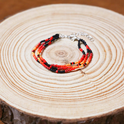 Sunset Harmony Beaded Necklace and Bracelets Set – Red, Orange, Yellow, and Black Design