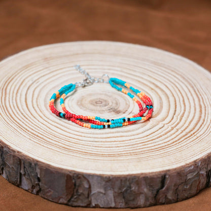 Sunset Glow Beaded Necklace And Bracelets Set – Multi-Strand with Red, Orange, and Turquoise Beads