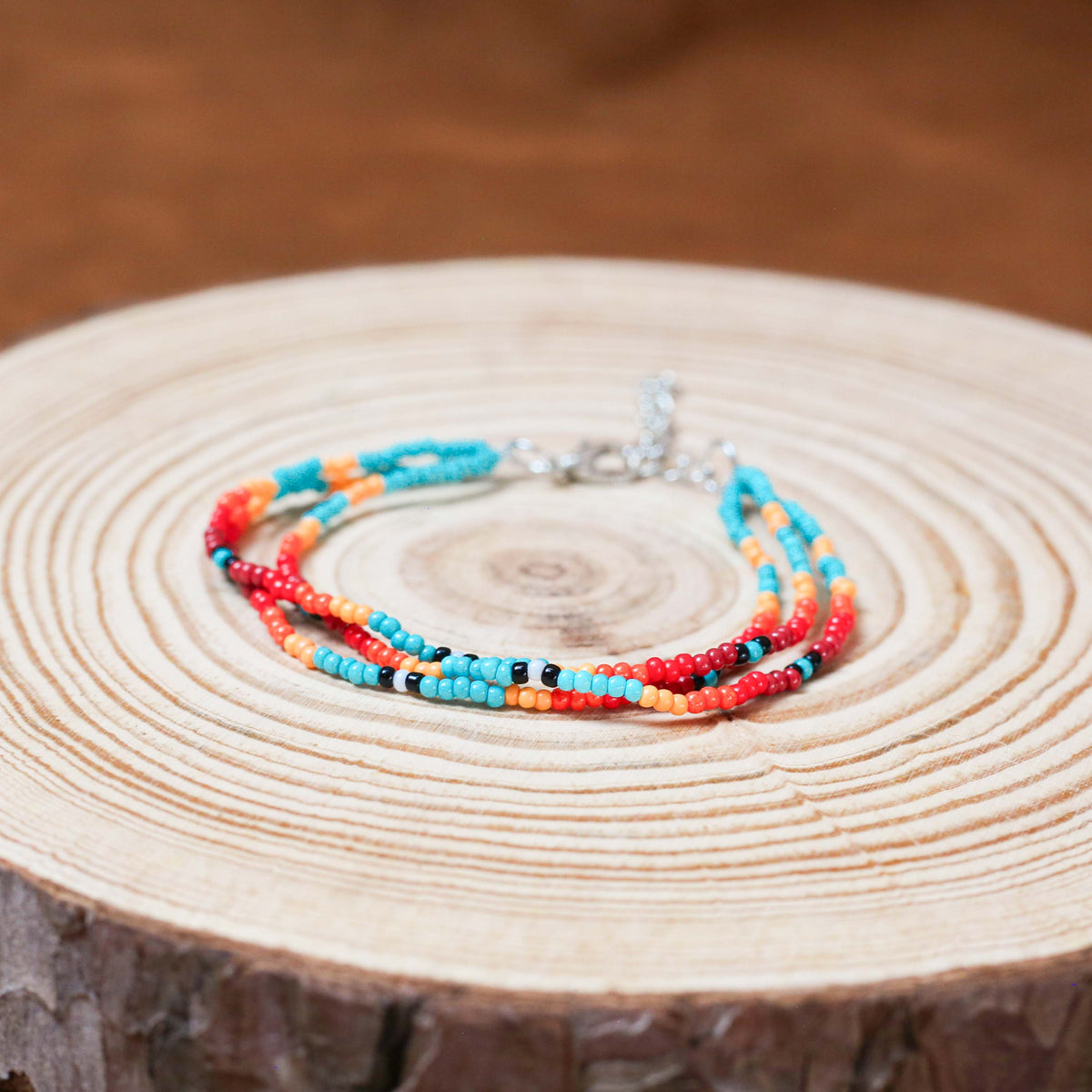 Sunset Glow Beaded Necklace And Bracelets Set – Multi-Strand with Red, Orange, and Turquoise Beads
