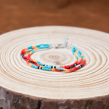 Sunset Glow Beaded Necklace And Bracelets Set – Multi-Strand with Red, Orange, and Turquoise Beads