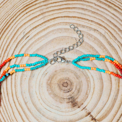 Sunset Glow Beaded Necklace – Multi-Strand with Red, Orange, and Turquoise Beads
